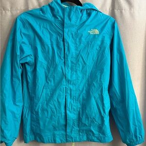 Girls Large North Face rain coat in bright teal